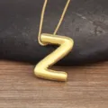 Gold-plated puffed letter Z pendant necklace, shiny alphabet initial jewelry item. - Letter Z