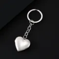 Stainless steel heart locket keychain detail, glossy finish photo holder pendant key ring. - Heart Locket Keychain / Silver
