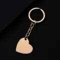 Dettaglio portachiavi a cuore in acciaio inossidabile oro rosa, anello metallico per regalo. - Cuore Inclinato / 30x28.5mm (Con Portachiavi) / Oro rosa