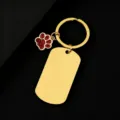 Gold stainless steel keychain with blank dog tag and sparkling red glitter paw charm. - Military Tag (50X28mm) with Red Glitter Dog Paw / Gold