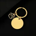 Edelstahl Schlüsselanhänger in Gold mit runder Gravurplatte und schwarzer Glitzerpfote. - Gold Basis Schwarze Pfote / 30mm Rund
