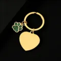 Stainless steel keychain detail showing gold-plated heart pendant and green glitter paw charm. - Heart Shape with Glitter Green Dog Paw / 1 Piece (30mm) / Gold