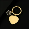 Gold metal keychain with heart pendant and black glitter dog paw charm for daily use. - Heart Shape with Black Glitter Dog Paw / 30mm / Gold