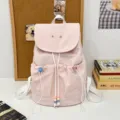 Pink cute casual backpack detail view featuring drawstring and front pocket design. - Pink