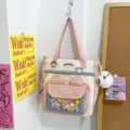 Niedliche rosa-weiße Canvas Tragetasche, große Kapazität Schüler Schulter Umhängetasche. - Mit Plüschanhänger / Rosa