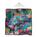Luxury silk square scarf featuring vibrant jungle floral and zebra print design for women. - B709