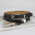 Black leather belt with silver heart pendant, stylish waist accessory for jeans and dresses. - 105cm / Black