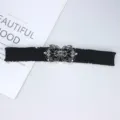 Vintage black elastic waist belt with ornate silver hollow buckle, perfect dress accessory. - Black (Silver Buckle)