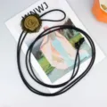 Cintura sottile in pelle nera variante con fiore verde scuro, accessorio chic per l'estate. - Stile Fiore / nero oro