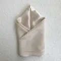 Exquisite mulberry silk square scarf in elegant beige, featuring a smooth and luxurious texture. - Apricot