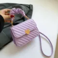 Trendy purple shoulder bag with heart lock and pleated handle for stylish women daily use. - Purple