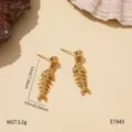 Gold fish bone dangle earrings close-up, featuring detailed metallic texture for summer. - Fish Bone (E1943)
