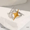 Detailed view of asymmetric star open ring in stainless steel with dual-tone finish. - Gold Silver (R1051)