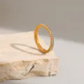 Minimalist gold titanium steel ring featuring a delicate row of sparkling pavé rhinestones. - Size 7 / Full Rhinestone Style (R1012) / Gold