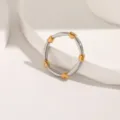 Two-tone stainless steel stacking ring featuring cute gold-plated heart details for women. - Gold Heart Ring Size 7