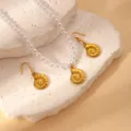 Exquisite golden conch pendant necklace and earrings set featuring elegant white pearls, fine detail. - Artificial Pearl Conch Set (BJGS0114)