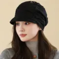 Detailed view of the elegant black lace hollow breathable peaked cap for daily wear. - Adult / Rust red