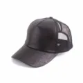 Close-up detail of the black glitter front panel and breathable mesh back on this womens baseball cap. - One Size / Black