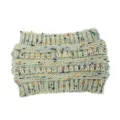 Dettaglio fascia in maglia che mostra un copricapo auricolare invernale texturizzato. - Taglia unica / Tulle a pois beige
