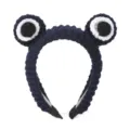 Detailed view of dark blue crochet cartoon eye headband, cute wool knit hair accessory. - Navy Blue / 55-58cm