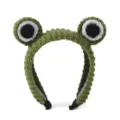 Detailed view of cute green crochet frog hair hoop with big eyes, soft plush design for daily wear. - Green / 55-58cm
