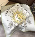 Silk square scarf featuring celestial sun moon and daisy print, elegant fashion accessory. - Sun