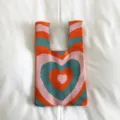 Gestrickte Tasche mit Wellenherz-Muster, süße lässige Umhängetasche für Damen Alltag. - 21x20x12cm / Rosa-orange Herzen