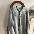 Grey sweatshirt featuring a layered polka dot sheer lace scalloped collar and black tie details. - Girls' Sheer Gauze