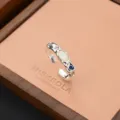 Vista dettagliata di un anello in argento stile fuso irregolare con opale e zircone. - Stile Strass Irregolare Vintage (JZ0082)