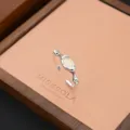 Detailed shot of the retro niche irregular ring, showcasing exquisite texture and opal stone. - Oval Vintage Gemstone Style (JZ0092)