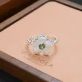 Silver flower ring detail with green gemstone, vintage aesthetic stylish statement jewelry piece. - Vintage Silver Flower Green Stone Style (JZ0210)