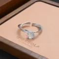 Adjustable silver ring with oval light blue stone multi strand twisted band fashion jewelry detail - Light Blue Oval Gemstone Twist Style (JZ0236)
