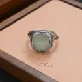 Vintage synthetic turquoise silver ring detail shot, ornate carved band for daily wear. - Square Turquoise Carved Style (JZ0274)