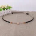 Elegant women's black skinny dress belt with gold hook buckle, chic minimalist accessory. - Gold Button (Black)