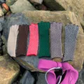 Detail view of stylish checkerboard knitted gloves in multi-colors, soft woolen texture for winter. - Checkerboard Style (R206S) / 35x9cm / Coffee
