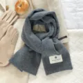 Soft gray wool scarf detail winter warm neckwear cozy knit accessory textured fabric daily wear - Gray