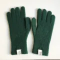 Guanti invernali caldi in maglia verde scuro da donna, guanti termici accoglienti con etichetta. - 10x24cm / Verde