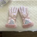 Close-up of pink winter windproof gloves with plush furry cuffs and delicate embroidery detail. - G005 / Pink