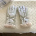 Close-up detail of winter warm windproof gloves with soft faux fur cuffs and elegant embroidery. - G005 / Apricot