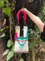 Handmade knit tote bag detail, featuring colorful heart pattern, green chain, pink handle. - Handle Set Style / Ivory