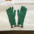 Green knitted touchscreen gloves detail, stylish winter warm five-finger wool gloves display. - Touch Screen Knitted Gloves / Green