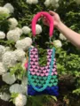 Gradient heart knit handbag detail showing vibrant colors and chunky chain strap. - Pink, Green & Blue with Rose Red Original Handle / Pink, Green, and Blue