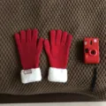 Red knitted winter gloves with plush cuffs detail shot, warm wool thermal touchscreen mittens. - 30x11cm / Red