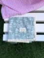 Close-up detail view of blue floral print cotton linen square scarf with lace trim. - 58x58cm / Light Green