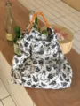 Koreanische Ins Blumige Tragetasche für Damen, Frühlings Sommer Picknick Handtasche Kordelzug. - Schwarz-Weißes Blumenmuster mit Orangefarbenem Seilgriff (1)