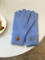 Detailed shot of light blue knit five-finger touchscreen gloves with cute bear and text embroidery. - 30x12cm / Sky Blue