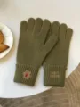 Detail view of winter knitted touch screen gloves in olive green with cute bear embroidery. - 30x12cm / Army Green