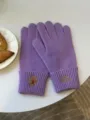 Detailed view of winter warm purple knit gloves with cute bear and letter embroidery. - 30x12cm / Purple