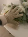 Detail shot of winter thermal touch screen gloves, fleece lined women cold weather cozy. - Off White