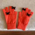 Orangefarbene Strick-Handschuhe mit Touchscreen-Funktion und schwarzen Schleifen für Damen. - 21x11cm / Orange